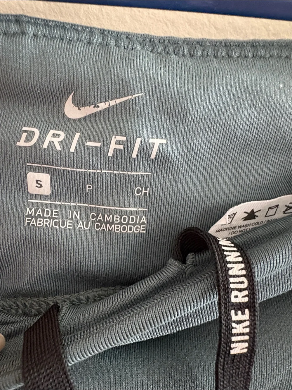Nike Dri-Fit Teal-Green Athletic Leggings with Reflective Side Panels
